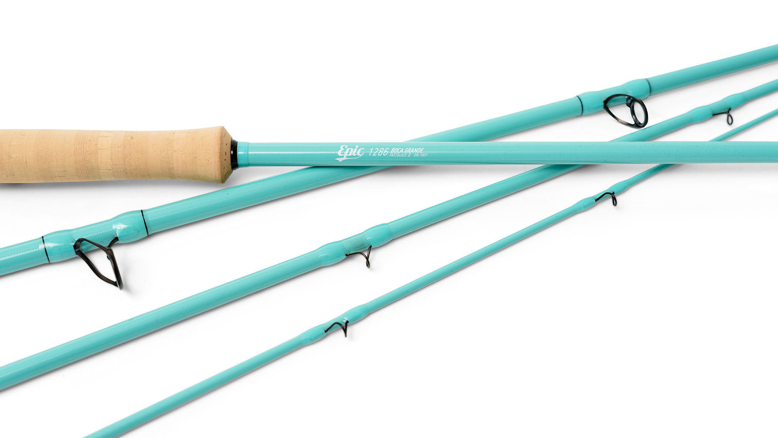 Fiberglass fly rod with cork handle on a white background